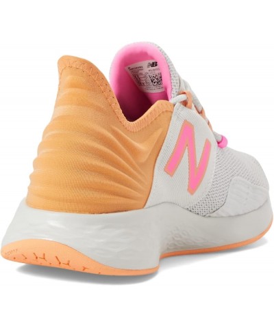 Women's Fresh Foam Roav V1 Sneaker Nimbus Cloud/Peach Glaze/Vibrant Pink $35.98 Athletic Shoes