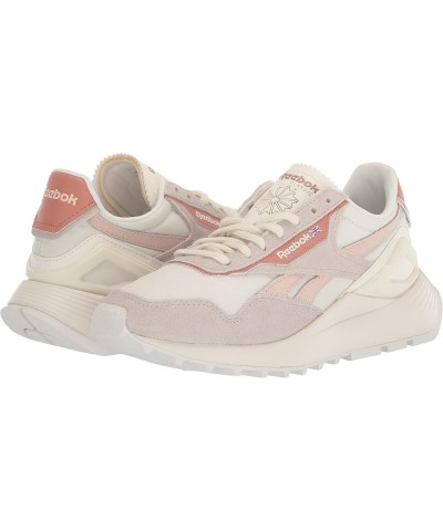 Women's Classic Leather Legacy Az Cross Trainer Soft Ecru/Canyon Coral/Chalk $43.51 Fashion Sneakers